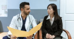 A physician discussing the procedures with the patient for Medicare